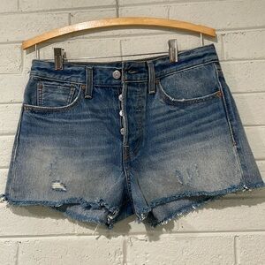 Levi’s slightly distressed button fly Jean shorts